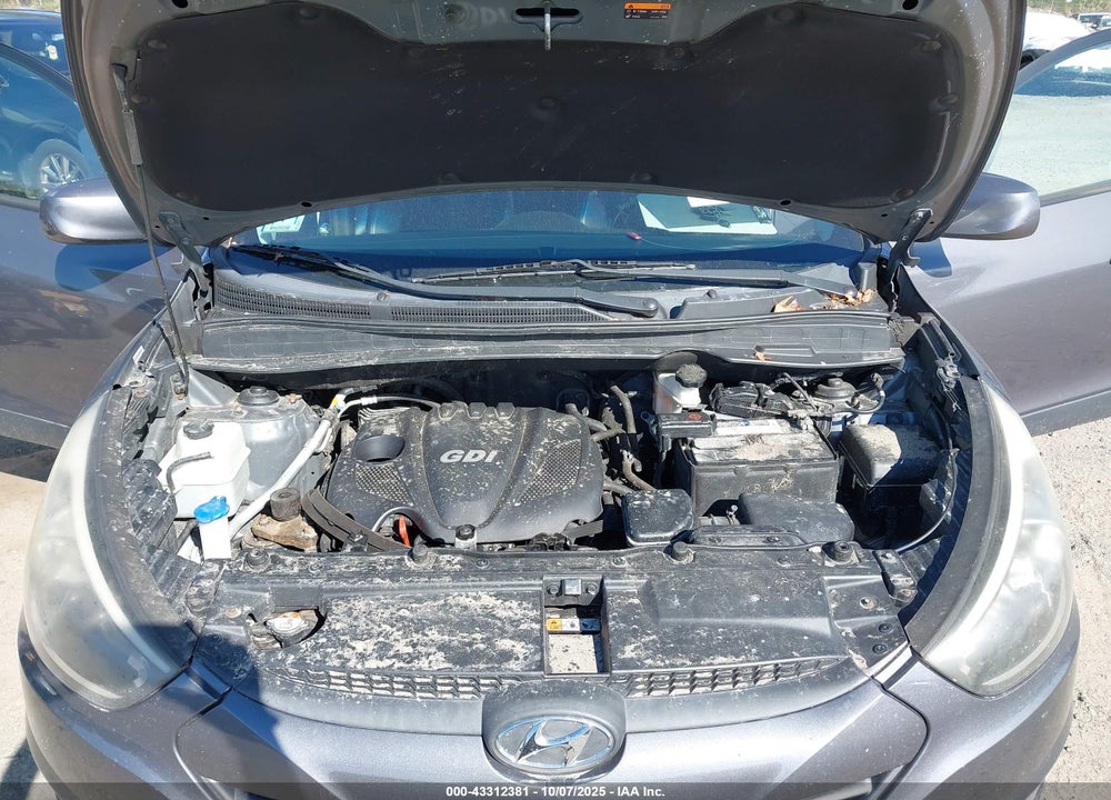2014 HYUNDAI TUCSON SE VIN: KM8JUCAG9EU942713