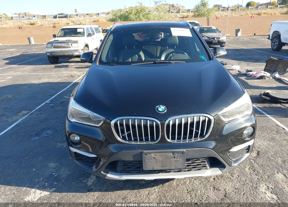 2017 BMW X1 VIN: WBXHT3Z30H4A54093
