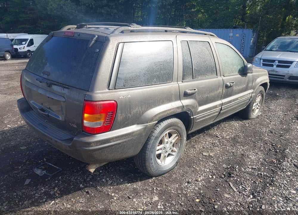 1999 JEEP GRAND CHEROKEE LIMITED VIN: 1J4GW68N2XC801676