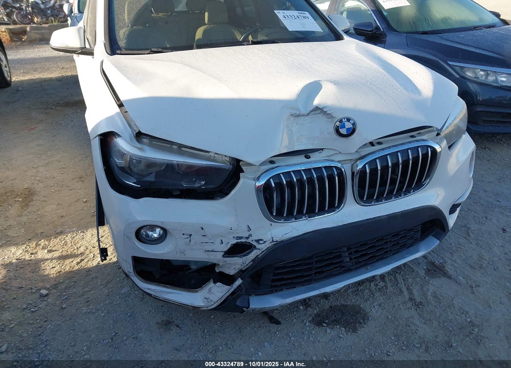 2018 BMW X1 VIN: WBXHT3C34J5K25689