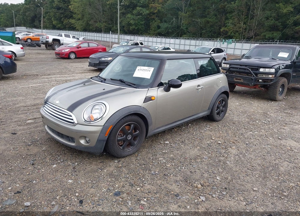2010 MINI COOPER VIN: WMWMF3C52ATZ62595