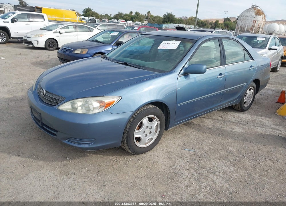 2003 TOYOTA CAMRY LE V6 VIN: 4T1BF32K73U560095