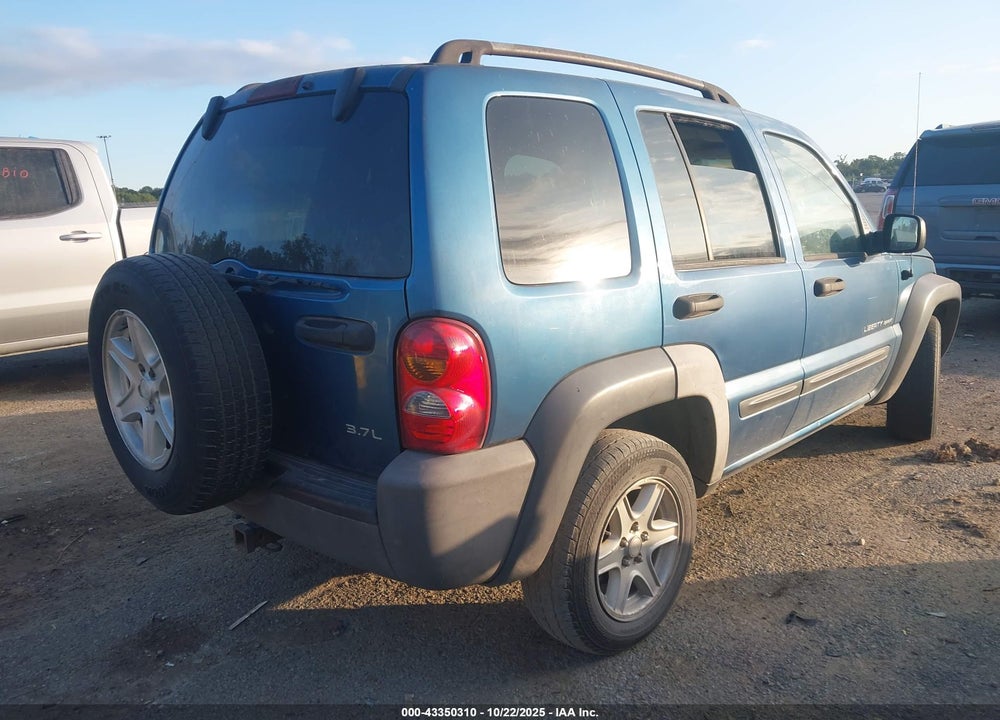 2003 JEEP LIBERTY SPORT VIN: 1J4GK48K13W568596
