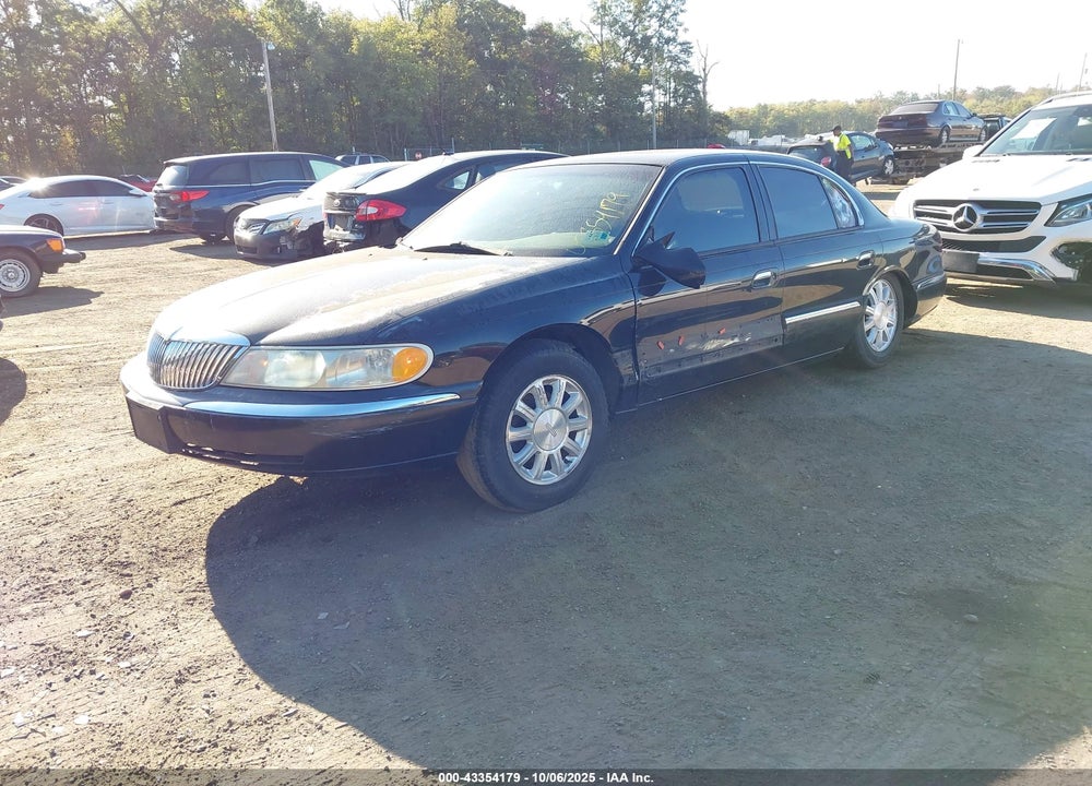 1999 LINCOLN CONTINENTAL VIN: 1LNHM97V7XY609915