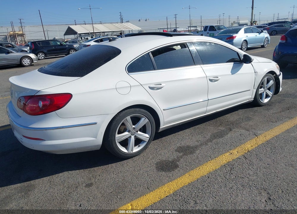 2009 VOLKSWAGEN CC VIN: WVWHL73CX9E548211