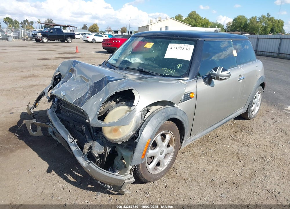 2009 MINI COOPER VIN: WMWMF33549TT69655