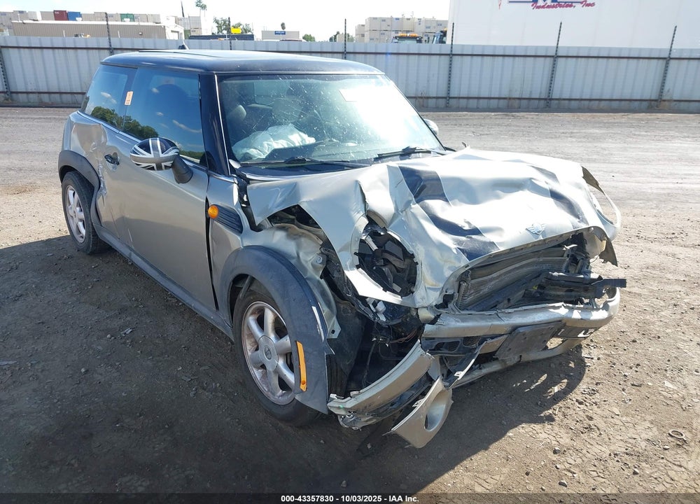 2009 MINI COOPER VIN: WMWMF33549TT69655