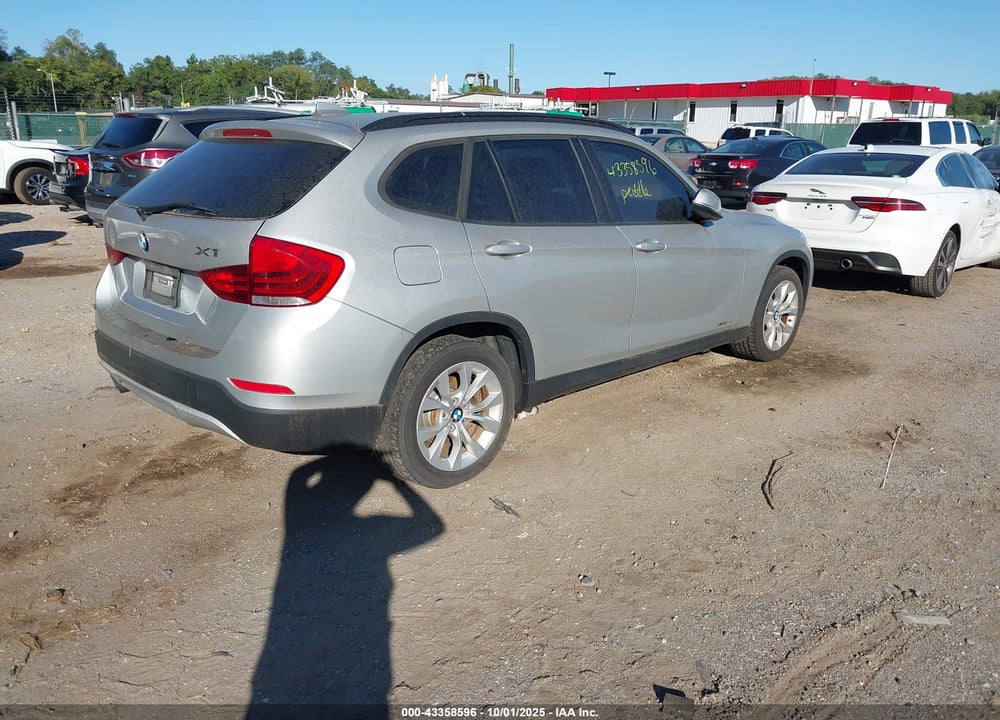 2014 BMW X1 VIN: WBAVL1C54EVY16291
