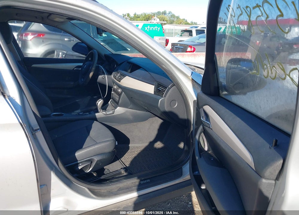 2014 BMW X1 VIN: WBAVL1C54EVY16291