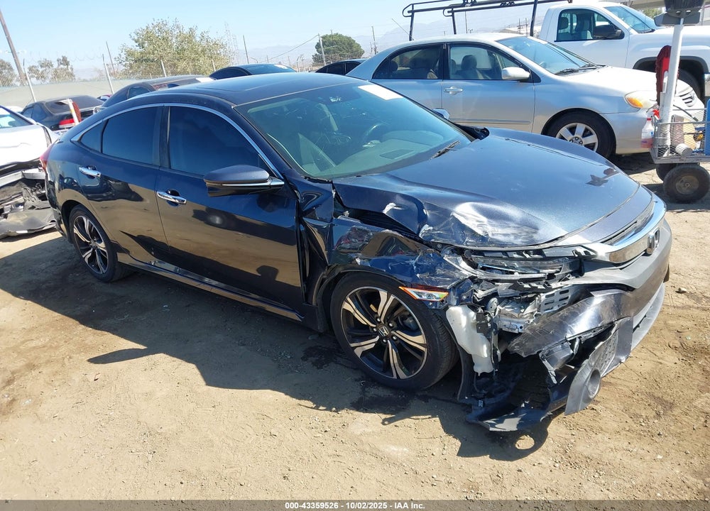 2016 HONDA CIVIC TOURING VIN: 19XFC1F95GE212116