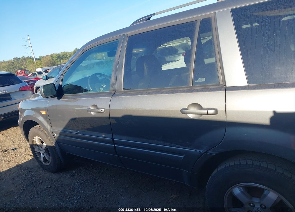 2007 HONDA PILOT EX-L VIN: 2HKYF18567H518599
