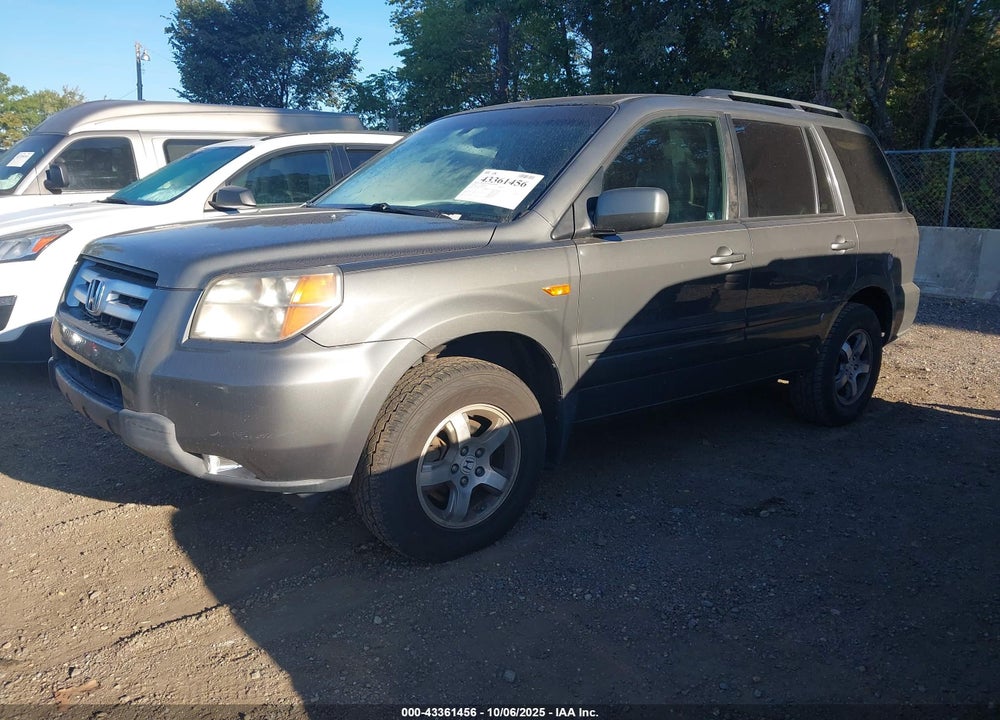 2007 HONDA PILOT EX-L VIN: 2HKYF18567H518599