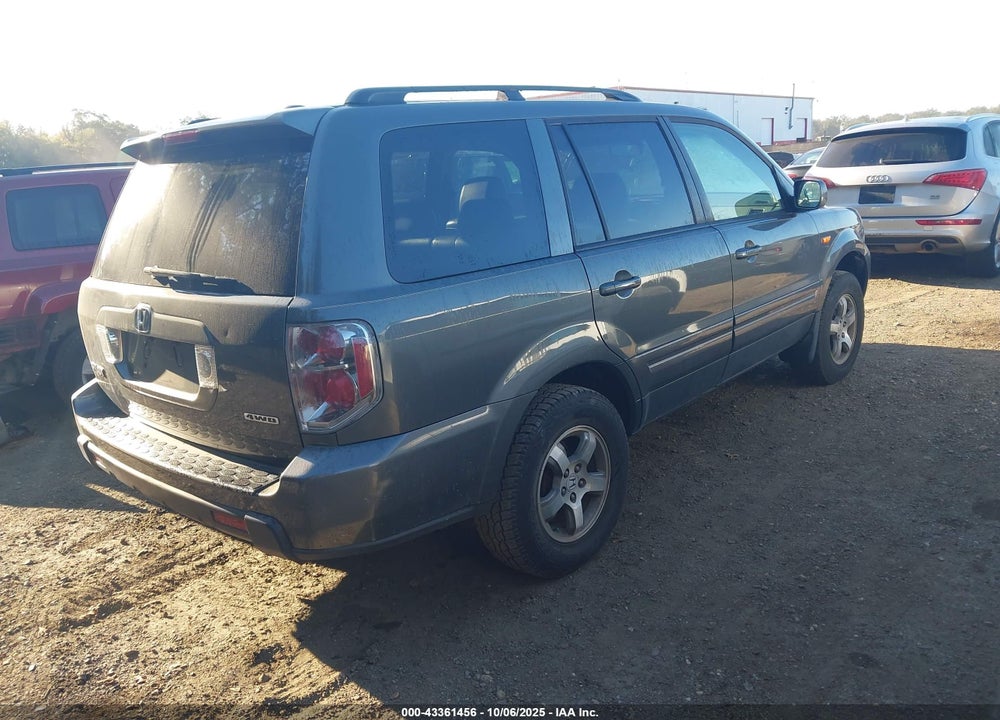 2007 HONDA PILOT EX-L VIN: 2HKYF18567H518599