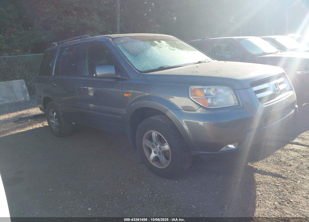 2007 HONDA PILOT EX-L VIN: 2HKYF18567H518599