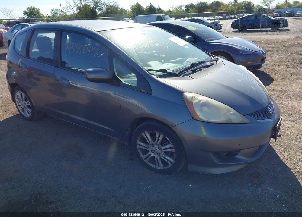 2011 HONDA FIT SPORT VIN: JHMGE8G57BC004403