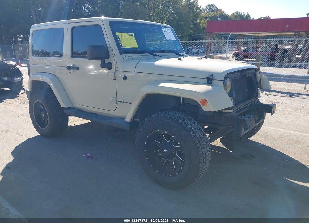 2011 JEEP WRANGLER SAHARA VIN: 1J4AA5D12BL557411