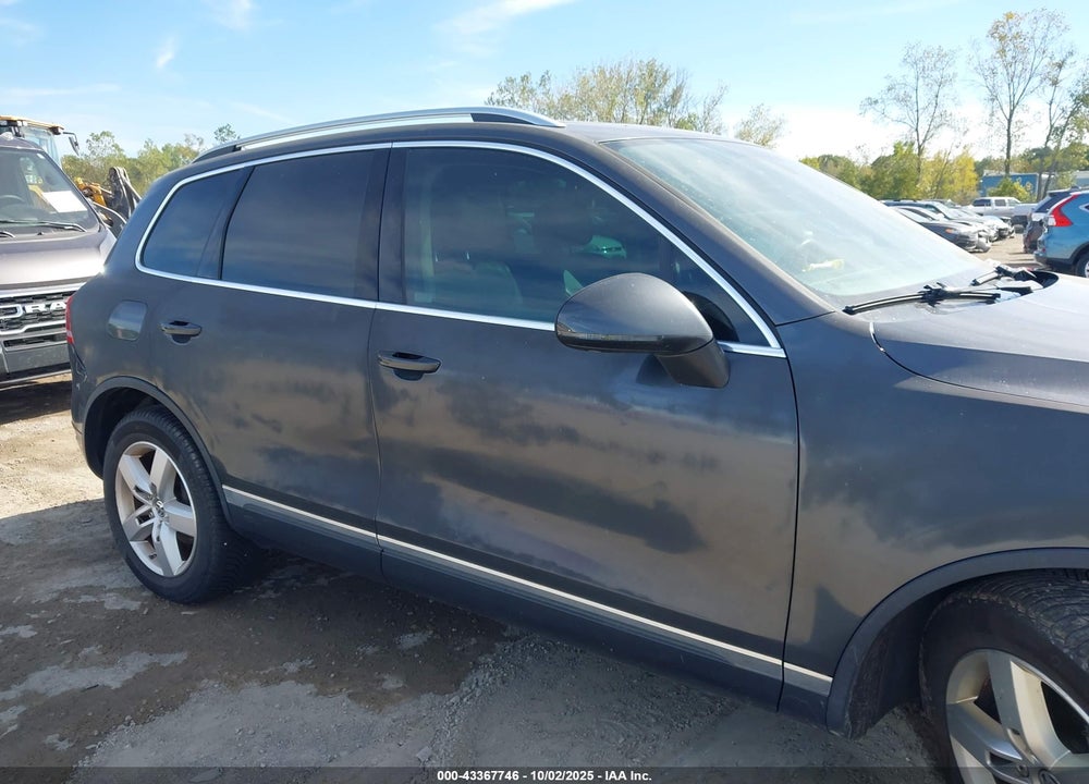 2013 VOLKSWAGEN TOUAREG VIN: WVGEP9BP9DD007068