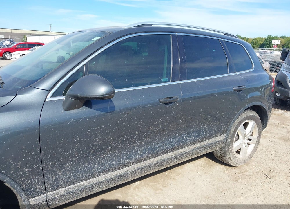 2013 VOLKSWAGEN TOUAREG VIN: WVGEP9BP9DD007068