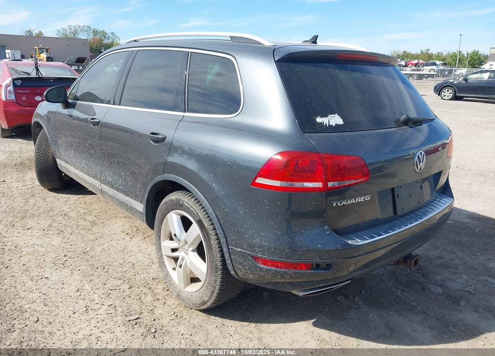 2013 VOLKSWAGEN TOUAREG VIN: WVGEP9BP9DD007068