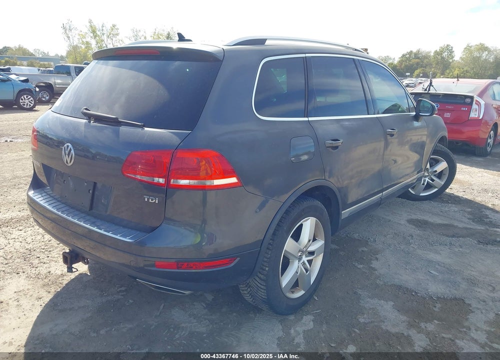 2013 VOLKSWAGEN TOUAREG VIN: WVGEP9BP9DD007068