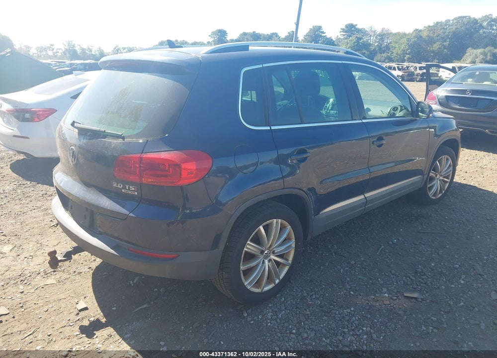 2014 VOLKSWAGEN TIGUAN VIN: WVGBV3AX8EW573932