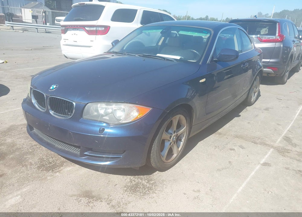2011 BMW 128I VIN: WBAUP9C56BVL90095