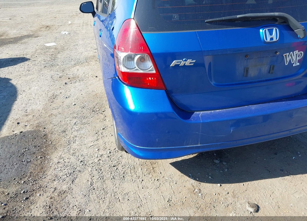 2007 HONDA FIT VIN: JHMGD38627S029557