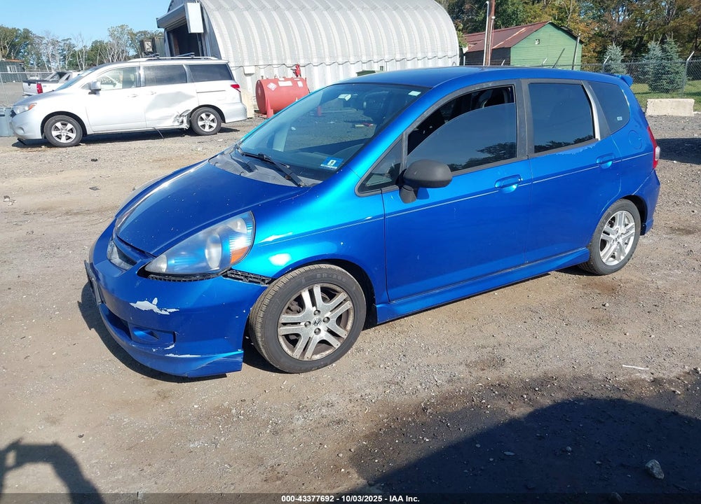 2007 HONDA FIT VIN: JHMGD38627S029557