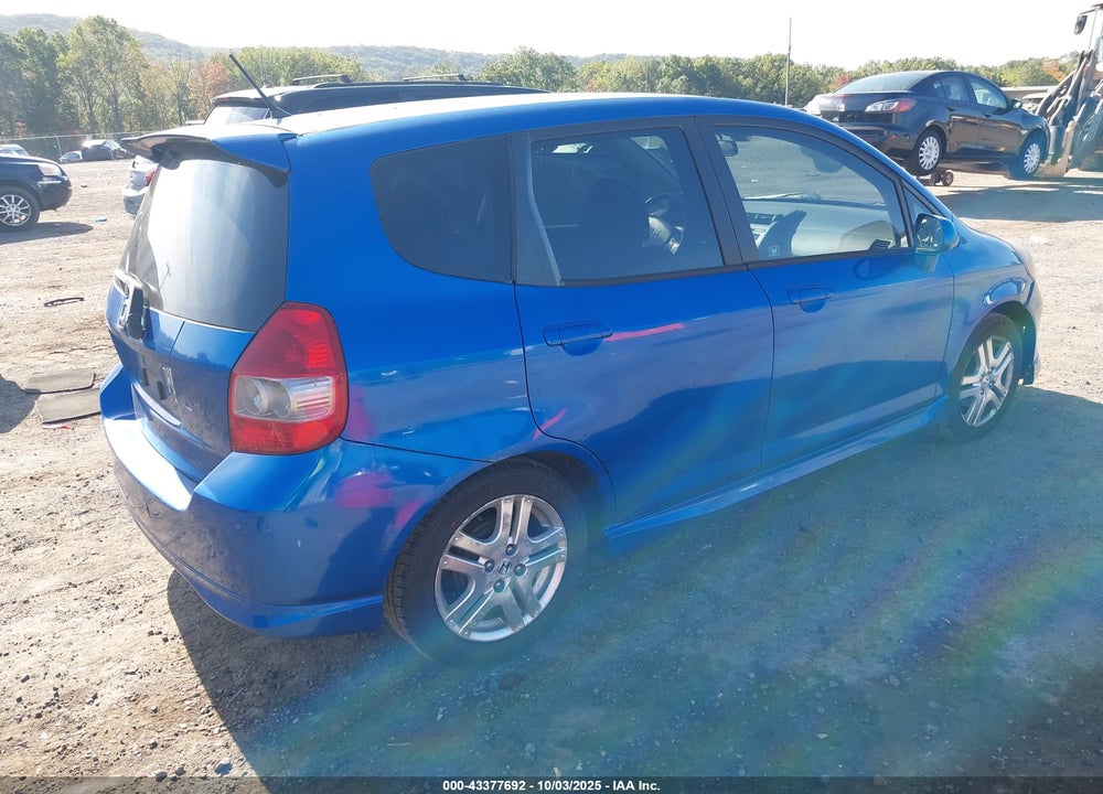 2007 HONDA FIT VIN: JHMGD38627S029557