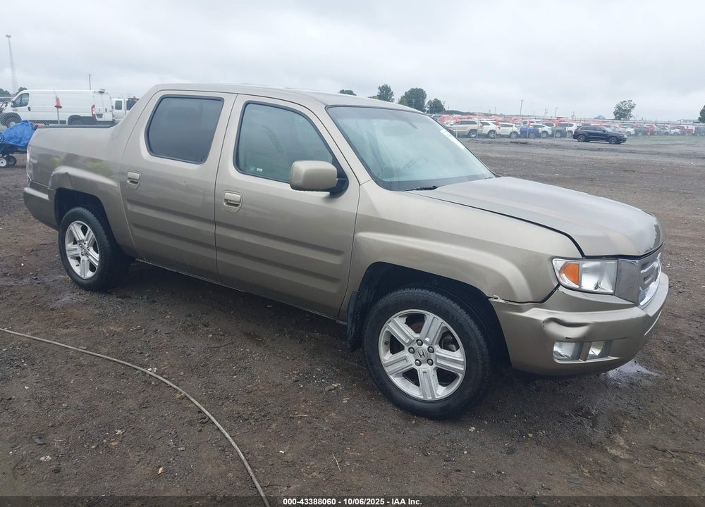 2011 HONDA RIDGELINE RTL VIN: 5FPYK1F54BB009978