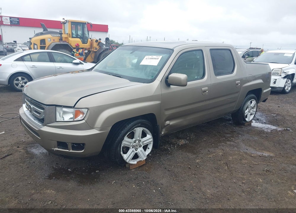 2011 HONDA RIDGELINE RTL VIN: 5FPYK1F54BB009978