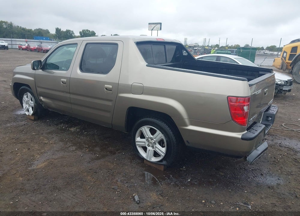 2011 HONDA RIDGELINE RTL VIN: 5FPYK1F54BB009978