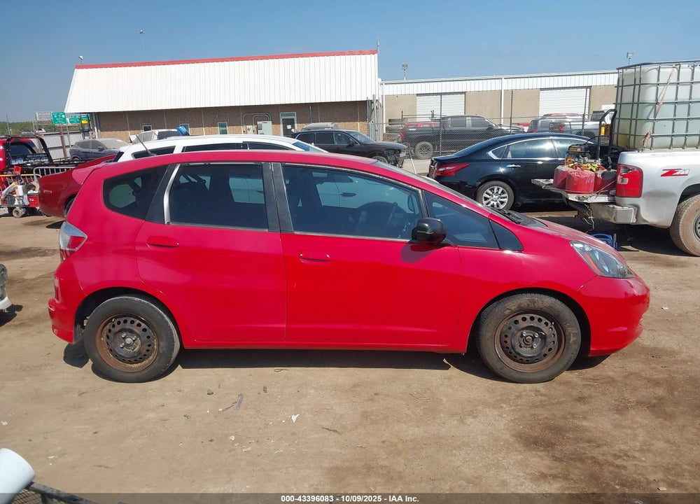 2009 HONDA FIT VIN: JHMGE882X9S014265