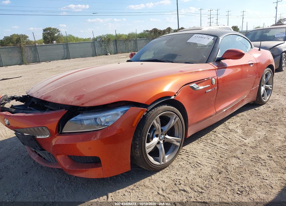2014 BMW Z4 VIN: WBALM7C51EE386243