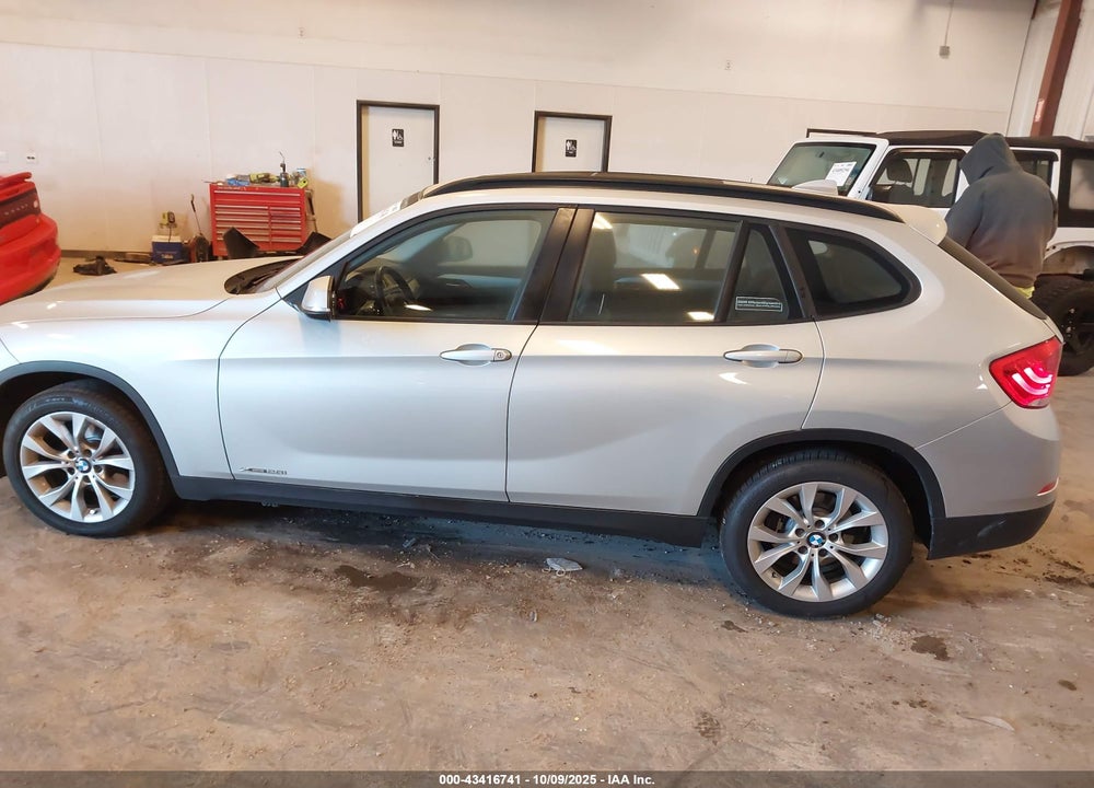 2014 BMW X1 VIN: WBAVL1C53EVY11194