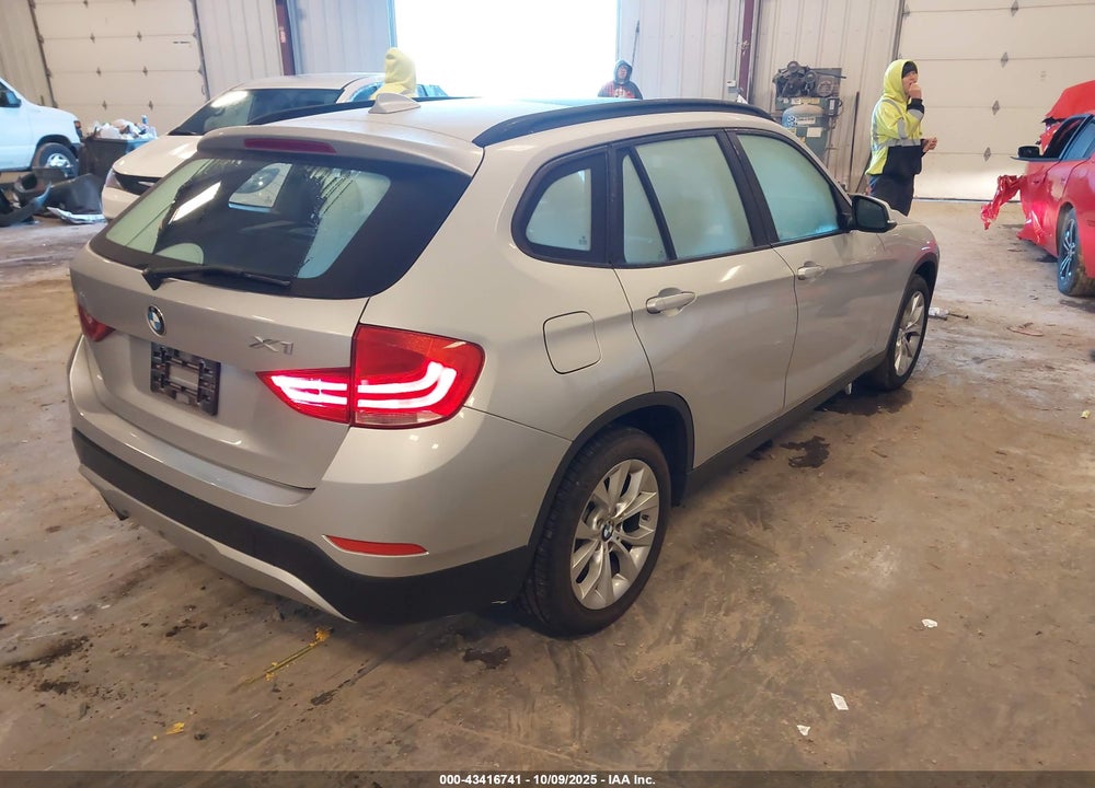 2014 BMW X1 VIN: WBAVL1C53EVY11194