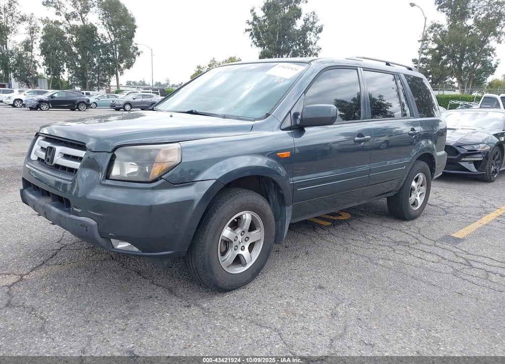 2006 HONDA PILOT EX-L VIN: 5FNYF28756B013903
