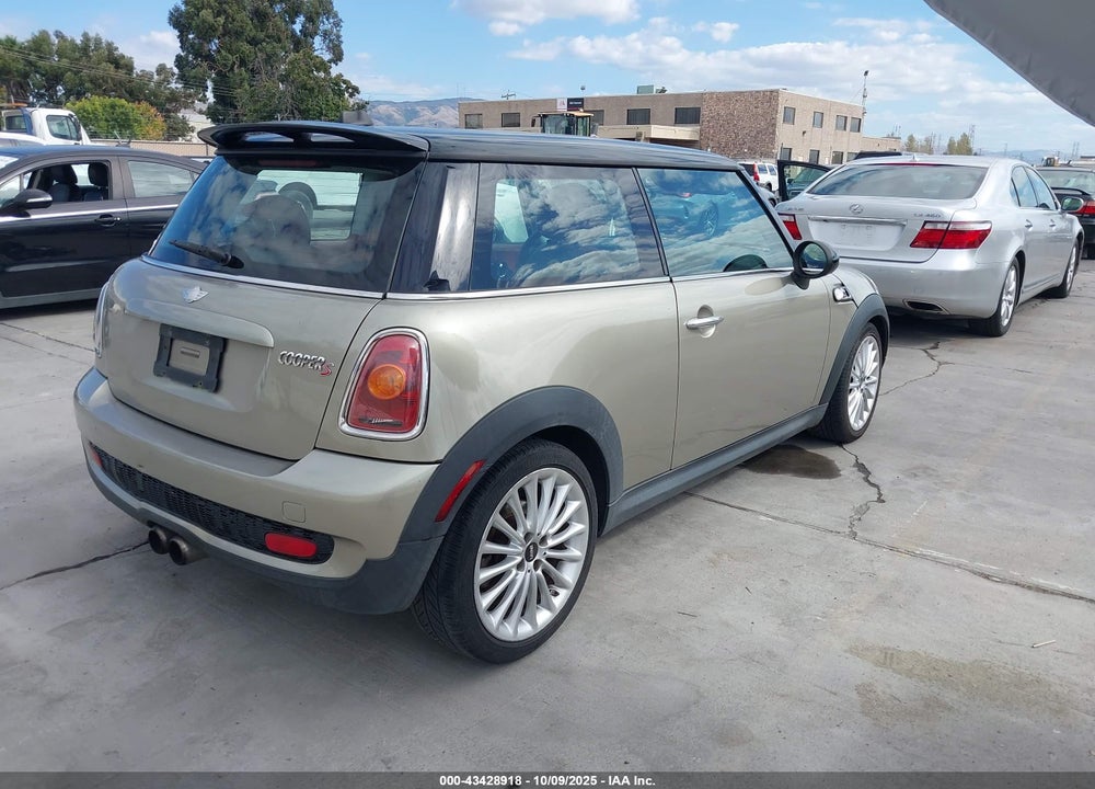 2007 MINI COOPER VIN: WMWMF73567TL83545