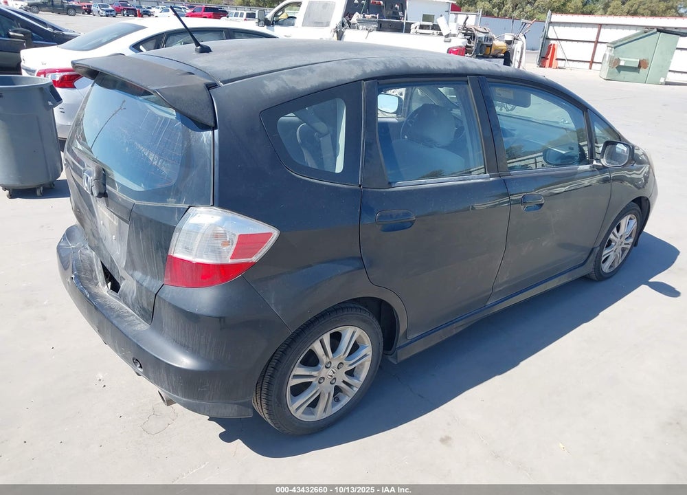 2009 HONDA FIT VIN: JHMGE88479S064509