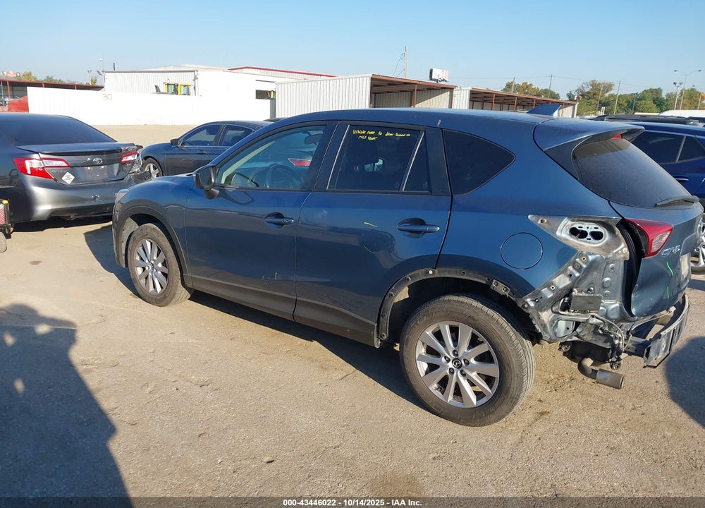 2015 MAZDA CX-5 TOURING VIN: JM3KE2CY5F0471018