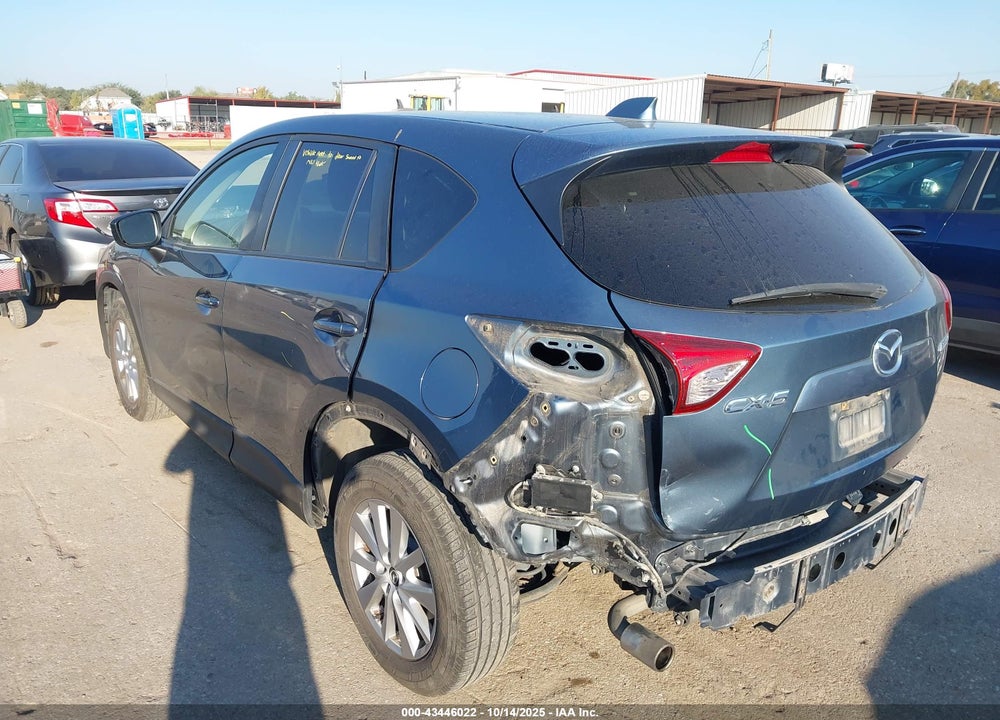 2015 MAZDA CX-5 TOURING VIN: JM3KE2CY5F0471018