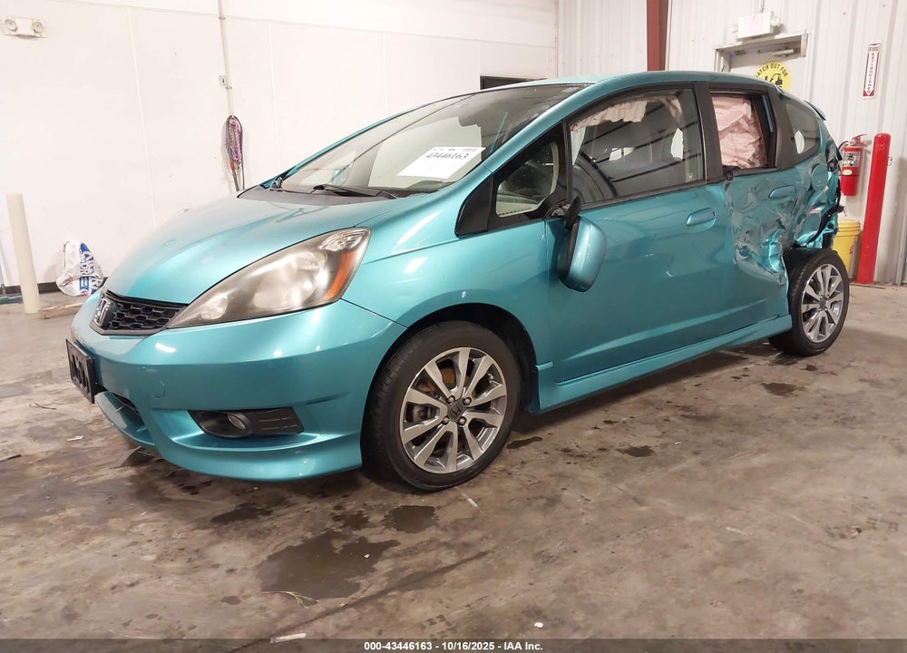 2012 HONDA FIT VIN: JHMGE8H57CC002943