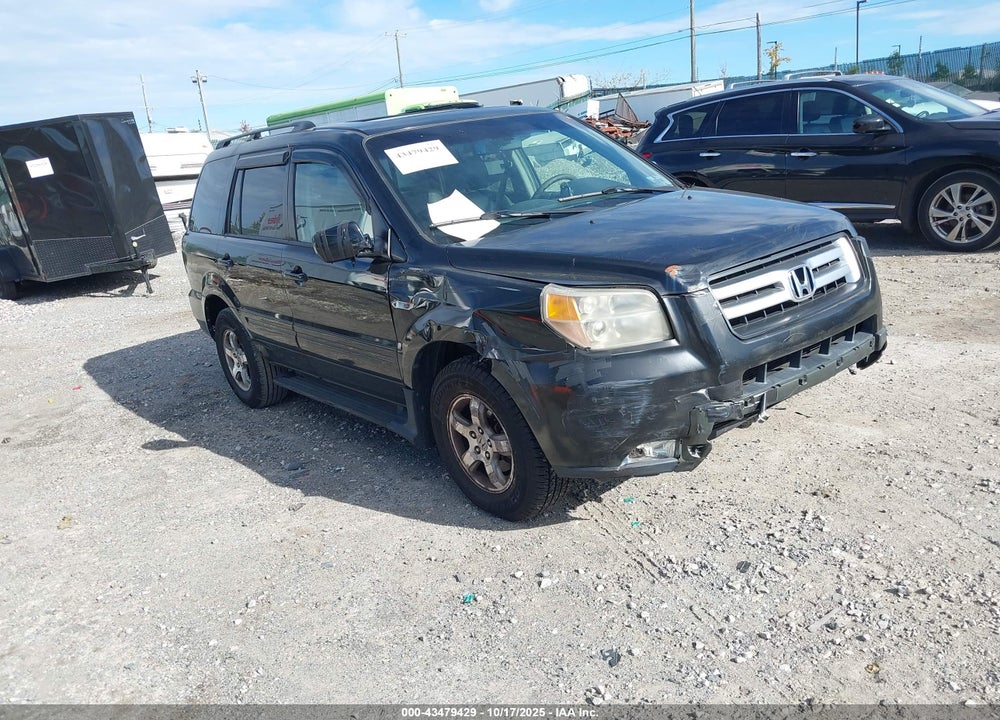 2007 HONDA PILOT EX-L VIN: 2HKYF18597H538782