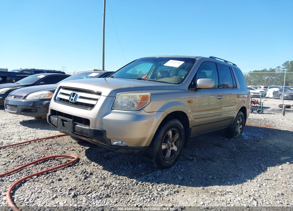2007 HONDA PILOT EX-L VIN: 5FNYF18597B017527
