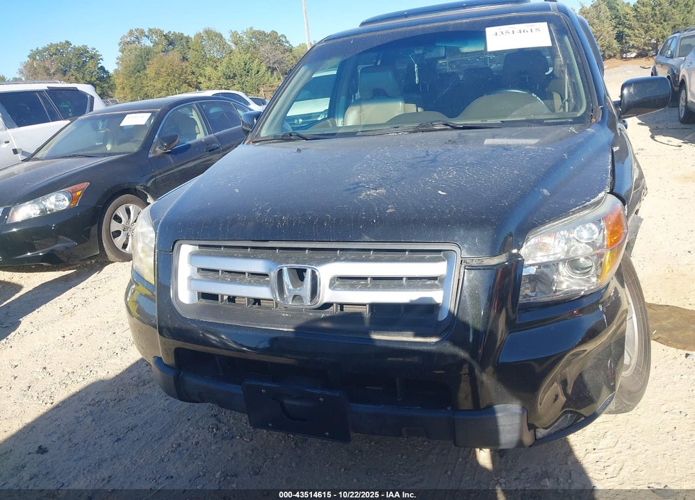 2007 HONDA PILOT EX-L VIN: 5FNYF28637B030255