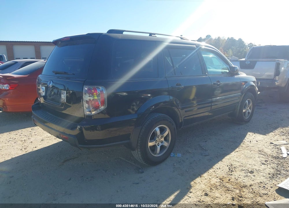 2007 HONDA PILOT EX-L VIN: 5FNYF28637B030255