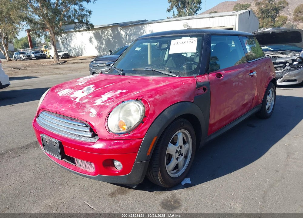 2010 MINI COOPER VIN: WMWMF3C57ATZ63869