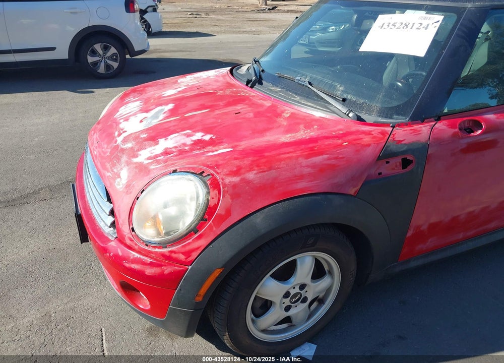 2010 MINI COOPER VIN: WMWMF3C57ATZ63869