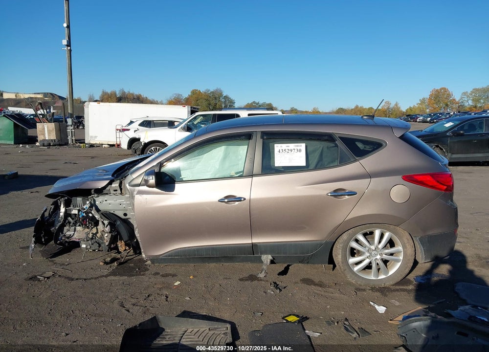 2012 HYUNDAI TUCSON VIN: KM8JUCACXCU436138