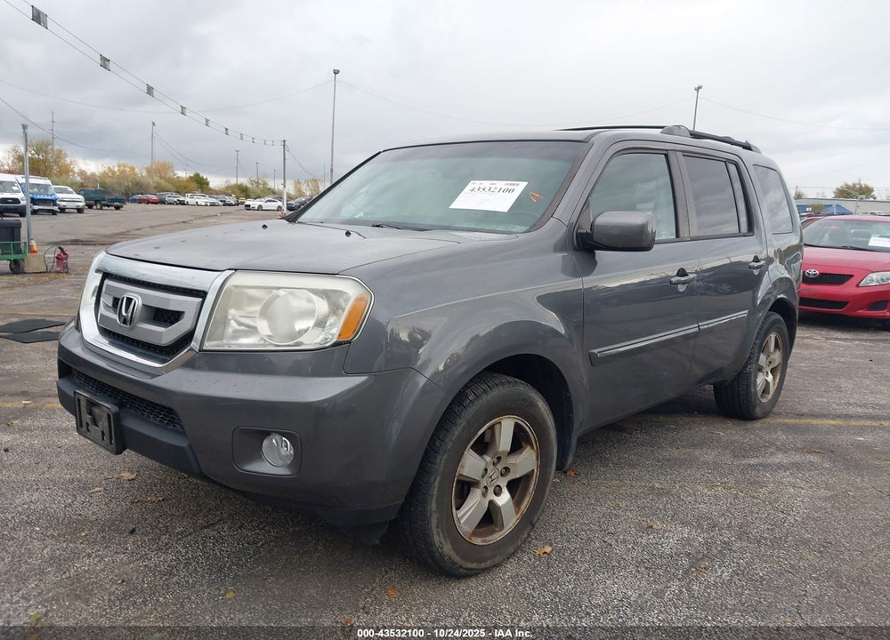 2011 HONDA PILOT EX-L VIN: 5FNYF4H55BB078139
